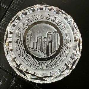 Solid crystal “Atlanta Skyline” paper weight.